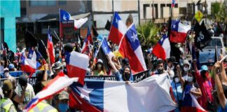 Protestan contra migrantes en chile